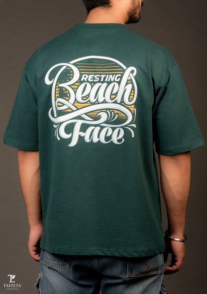 Emerald “Resting Beach Face” Oversized Tee.